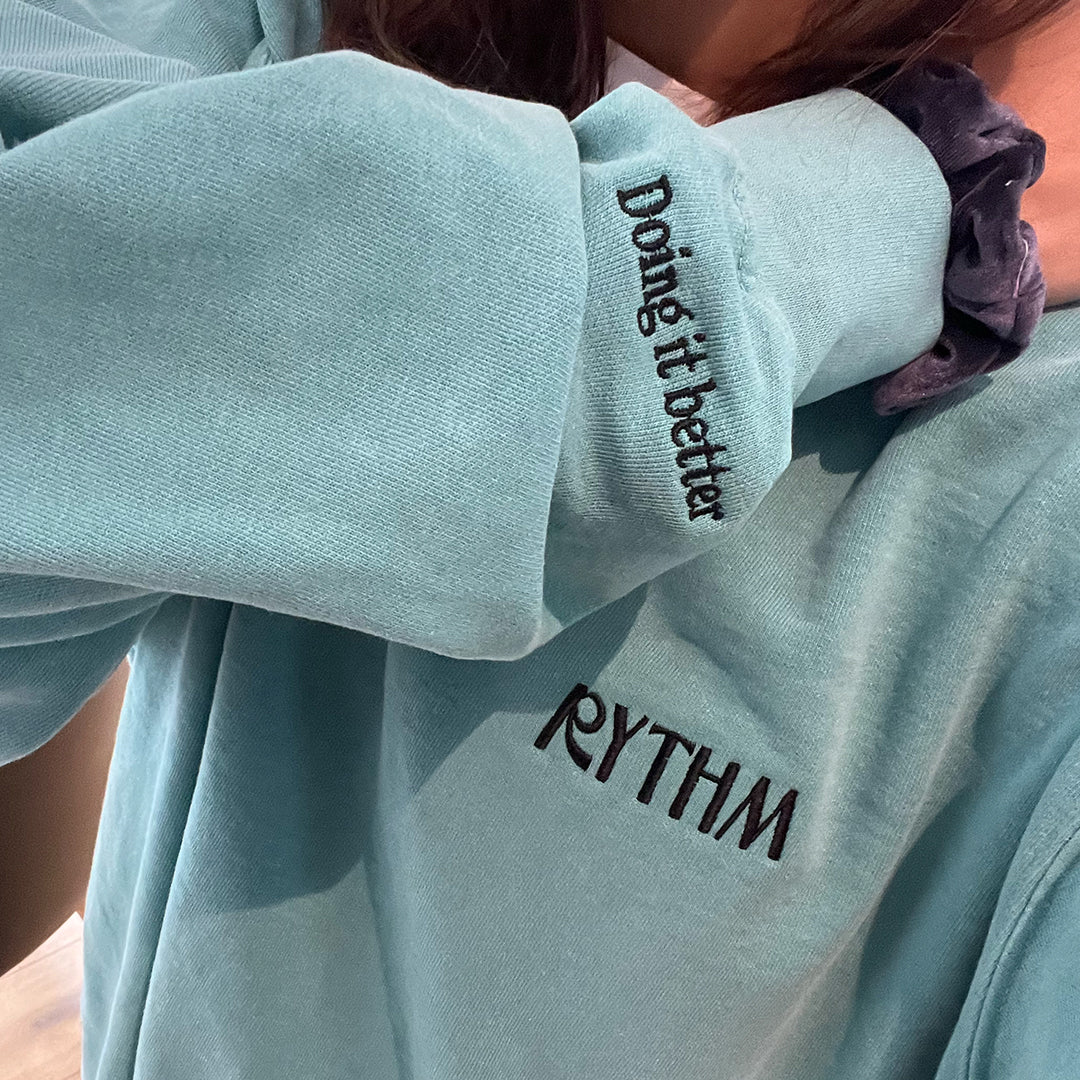 Rythm Doing It Better Sweatshirt logo and tagline. Lifestyle. Accessory. Sold by Rythm.